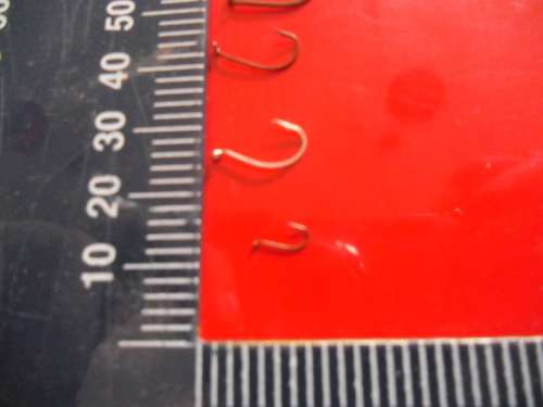 APPROXIMATELY 1500 SMALL MUSTAD AND TRIDENT FISHING HOOKS (NEVER BEEN USED)